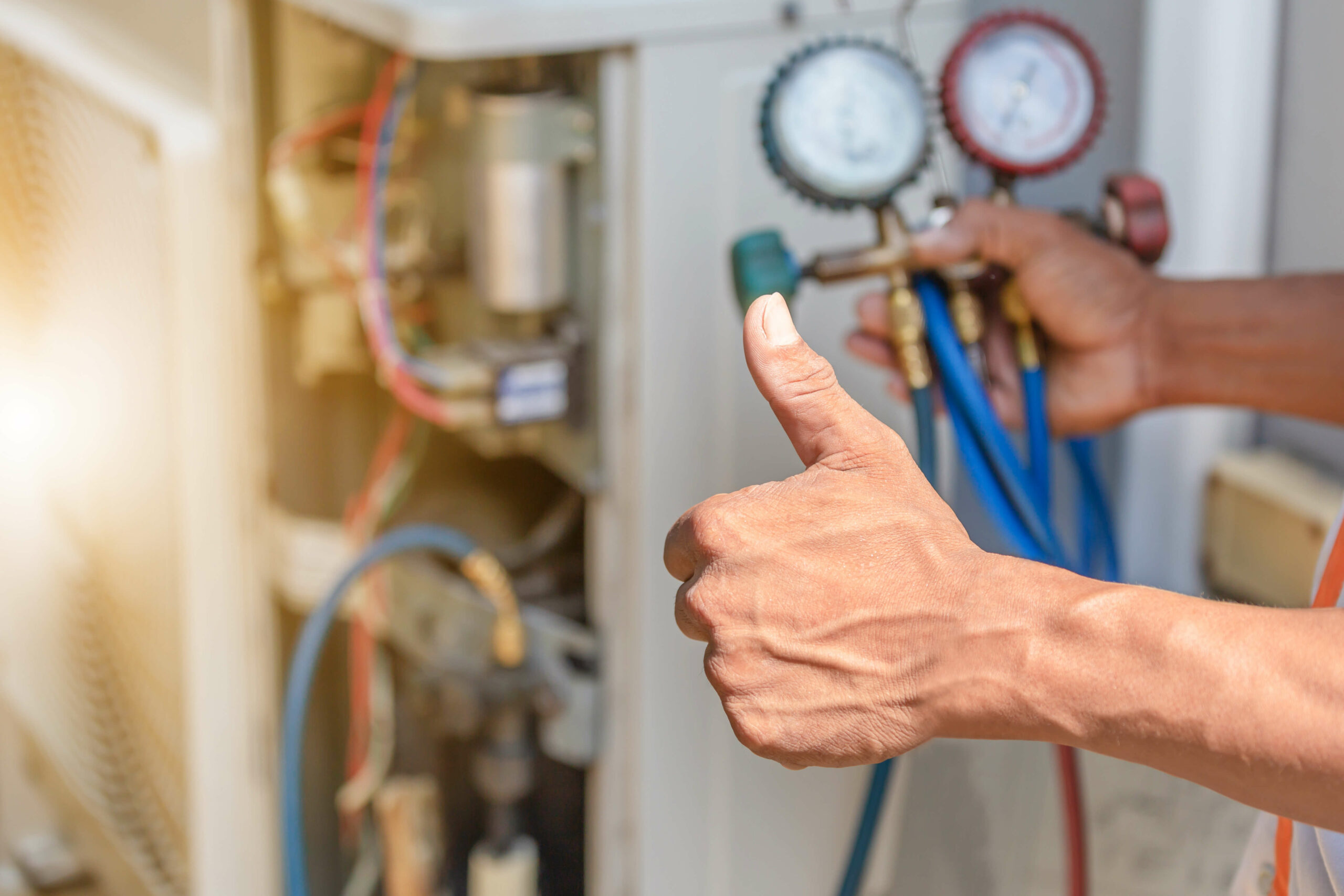 A thumbs up after successfully maintaining HVAC System